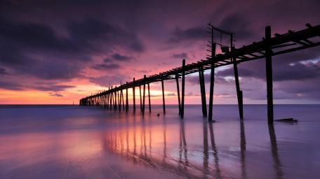 Purple Sunset Over Tranquil Phangnga Pier wallpaper