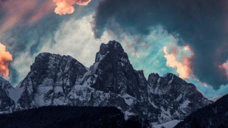 Alpine Peaks Under Dramatic Sky wallpaper