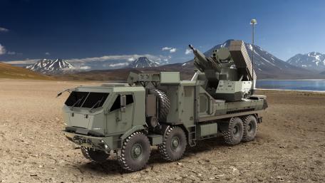Armored Air Defense Truck on Rugged Terrain wallpaper