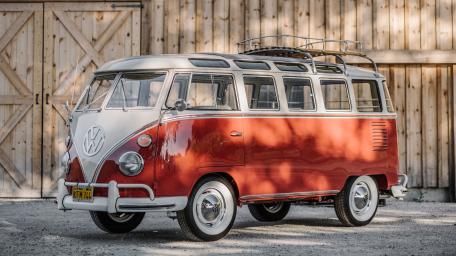 Classic Volkswagen Toy Camp Van on Rustic Wood Background wallpaper