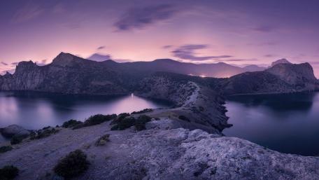 Purple Twilight Over Novyi Svit Cliffs wallpaper