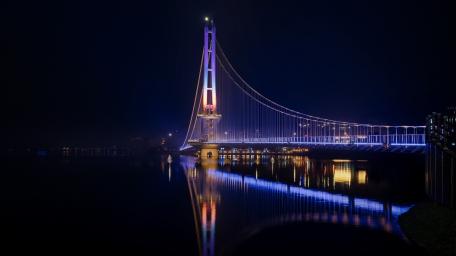 Yedangho Bridge Glowing Over Calm Water wallpaper