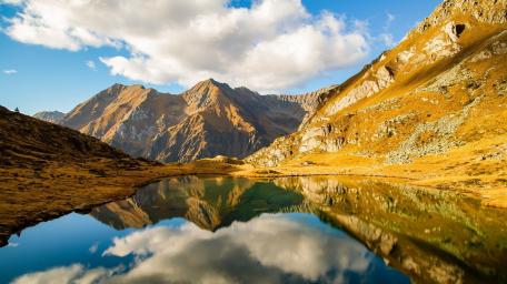 Golden Alpine Mirror at Lago di Bos wallpaper
