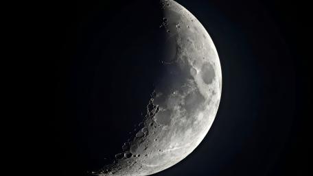 Luminous Crescent Moon in Deep Space wallpaper