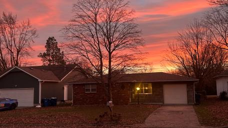 Serene Sunset Over a Quiet Neighborhood wallpaper