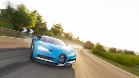 Blue Bugatti Chiron Drifting on Sunset Road wallpaper