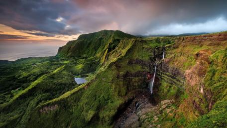 Verdant Cliffs and Cascading Waters of Flores Island wallpaper