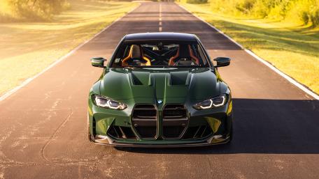 Green BMW M4 on Open Road wallpaper