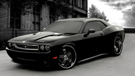 Sleek Black Dodge Challenger wallpaper