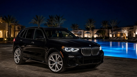 Luxurious Black BMW X5 Night Glow wallpaper