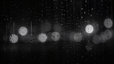 Rainy Night Bokeh Through Glass wallpaper