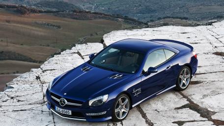 Blue Mercedes Benz SL on Scenic Cliff wallpaper