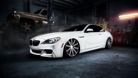 White BMW Coupe in Moody Garage wallpaper
