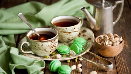 Elegant Teatime with Pistachio Macarons wallpaper