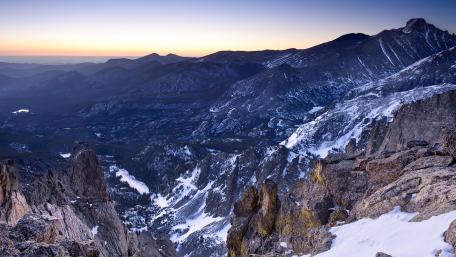 Snowy Peaks Over Rocky Mountain Valley wallpaper