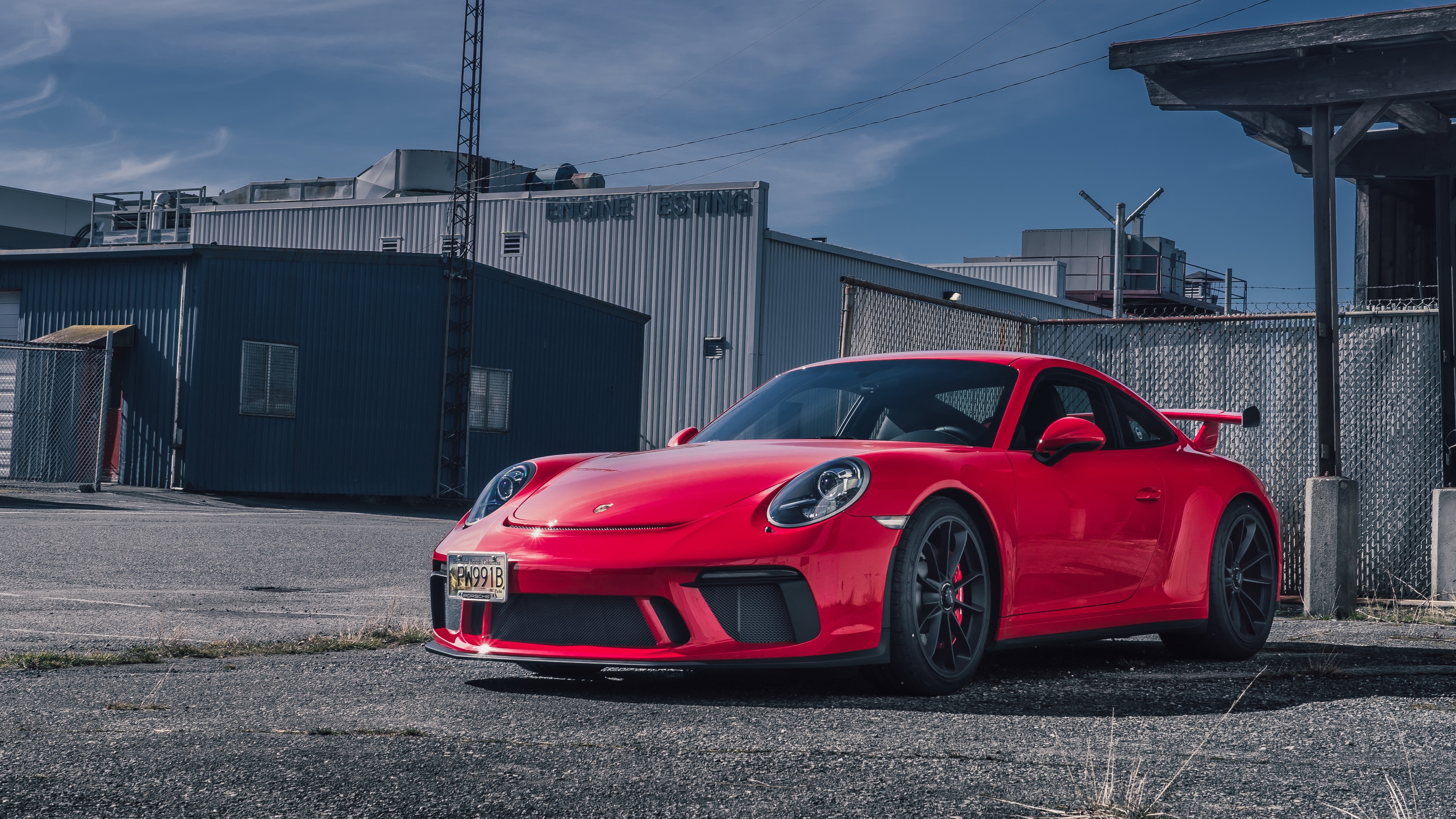 Red Porsche 911 in Industrial Streetlight Glow - backiee