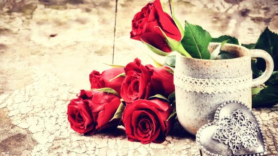 Red Roses and Heartfelt Celebrations wallpaper