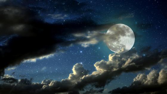 Majestic Full Moon Over Cloudy Night Sky wallpaper