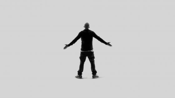 Eminem Stands Tall in Stark Silhouette wallpaper