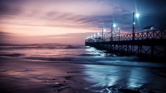 Pier in the Huanchaco Beach at dusk (Peru) wallpaper