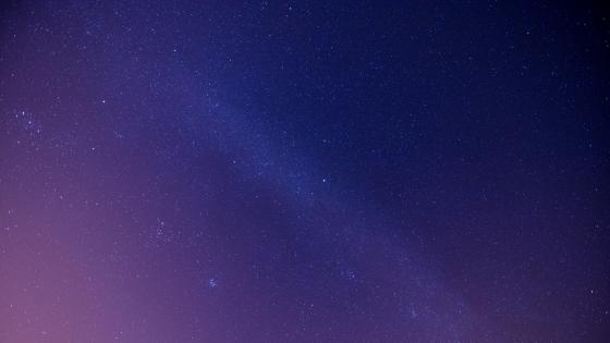 Starry Embrace of the Cosmic Ballet wallpaper