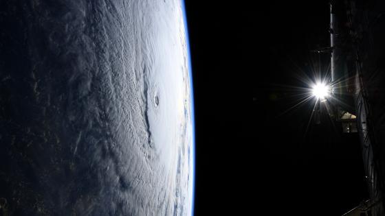 Space Station Flight Over Hurricane Lane wallpaper