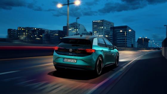 Electric Volkswagen in the Night Cityscape wallpaper
