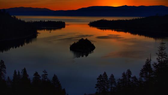 Serene Sunset Over Tranquil Waters - backiee