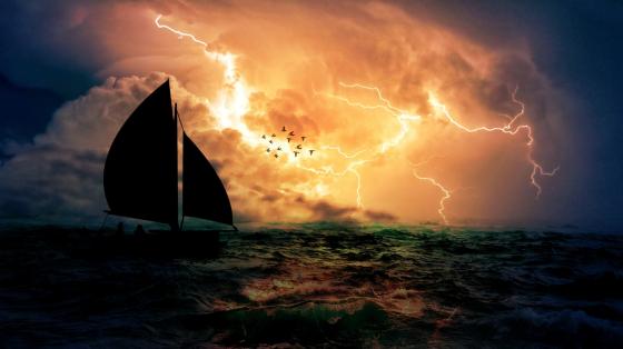 Thrilling Voyage Through Stormy Seas wallpaper