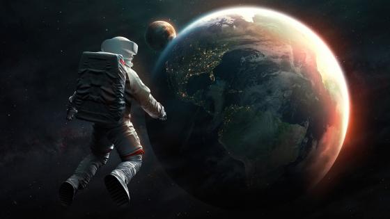 Astronaut's Cosmic Voyage wallpaper