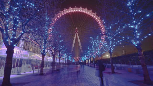 Illuminated Ferris wheel on winter night live wallpaper