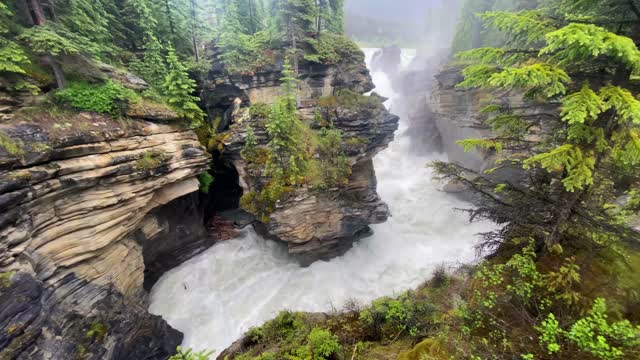 Rocky canyon with powerful waterfall live wallpaper