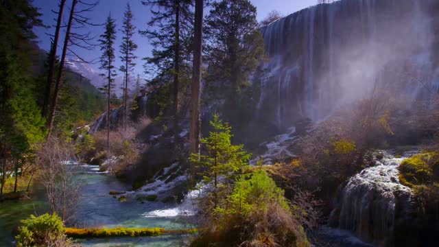 Waterfall in mountain forest valley live wallpaper