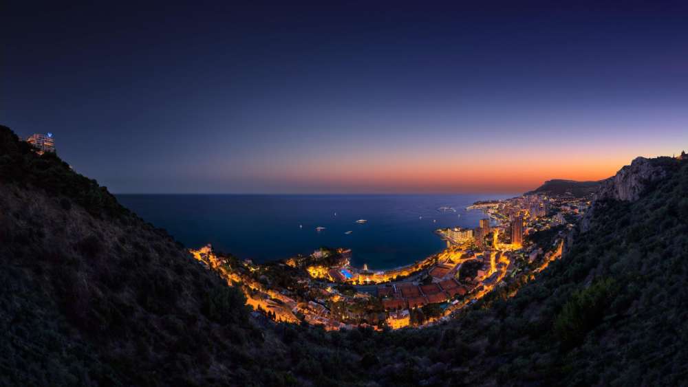 Panoramic view of Monte-Carlo, Monaco at night wallpaper
