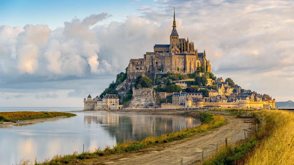 Le mont St Michel from the shore of the river Couesnon wallpaper