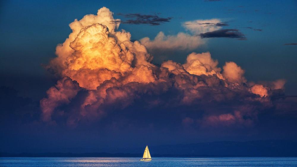 Lonely sailboat on the calm water wallpaper