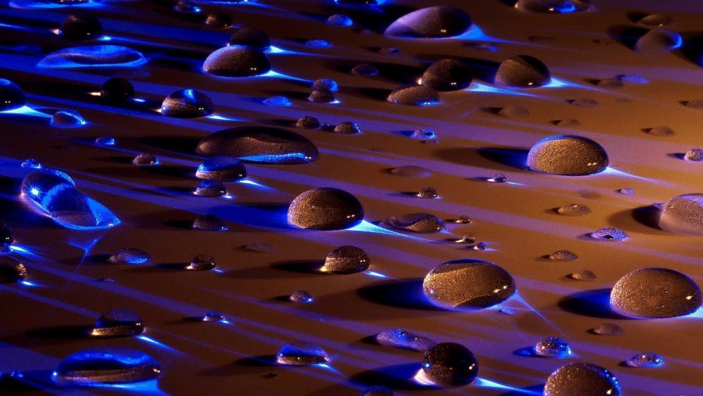 Waterdrops in the blue light wallpaper