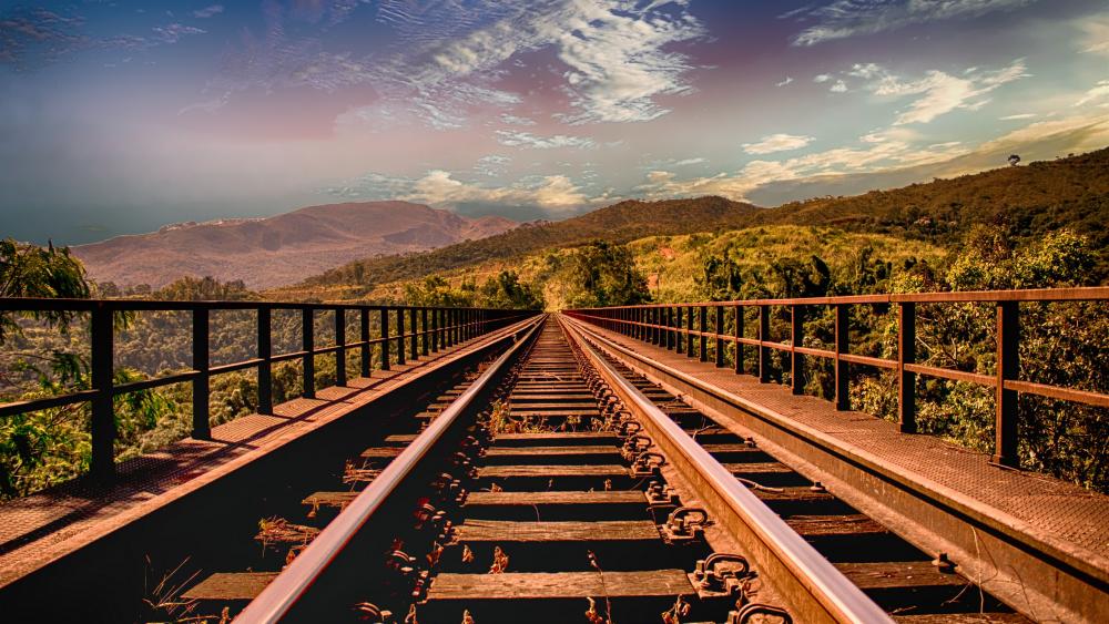 Railway track in mountains wallpaper