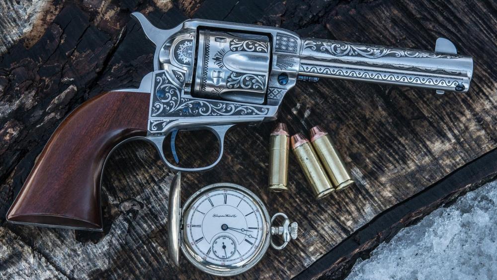 Antique pocket watch and a revolver wallpaper