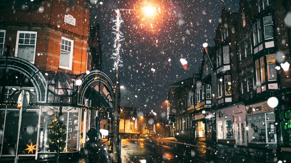 Snowfall in a town wallpaper