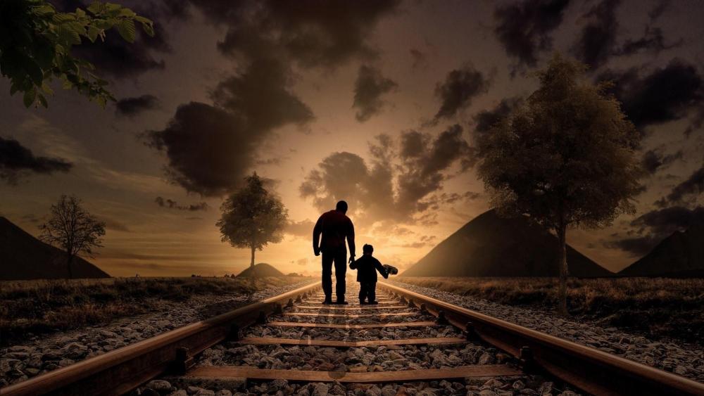 Father and son walking the railroad wallpaper