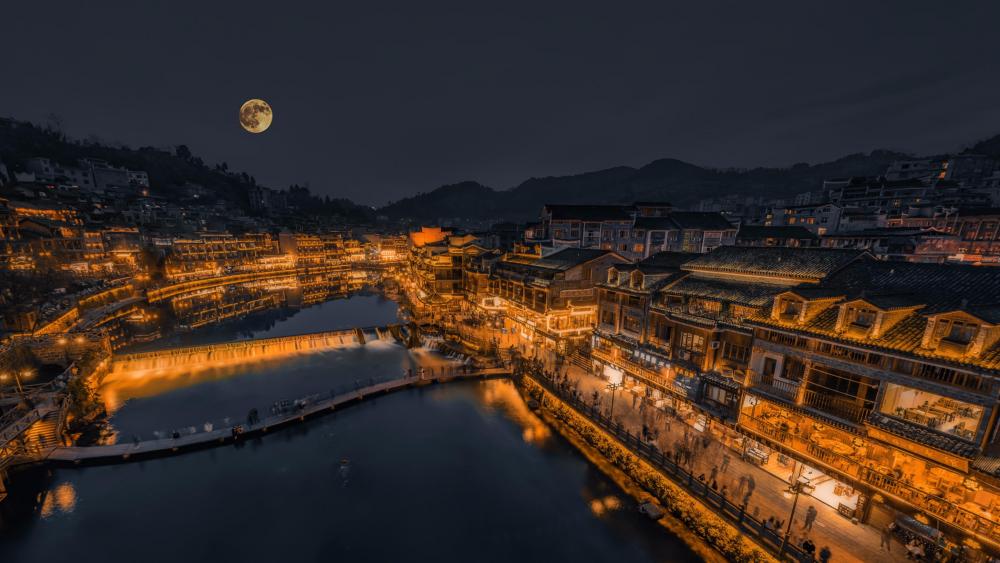 The moon in the ancient city wallpaper
