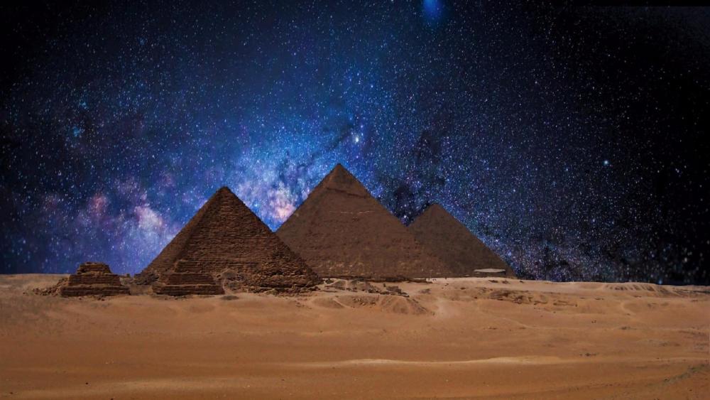 Egyptian Pyramids at night wallpaper