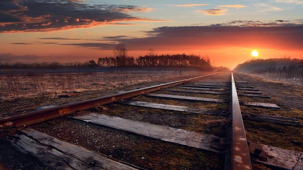 Old railroad in the sunset wallpaper