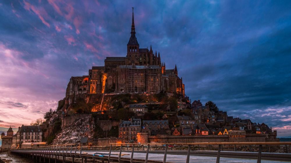 Mont Saint Michel Abbey at dusk wallpaper
