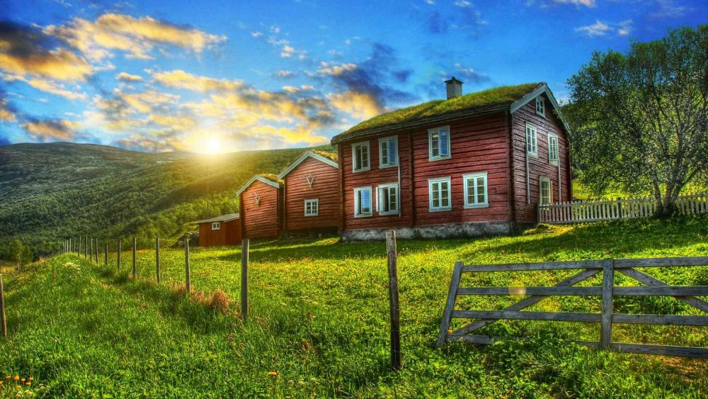 Country house with grass roof wallpaper