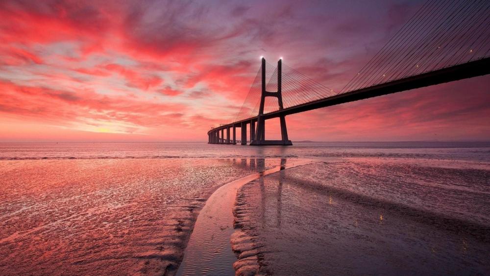 Vasco da Gama Bridge at sunset wallpaper