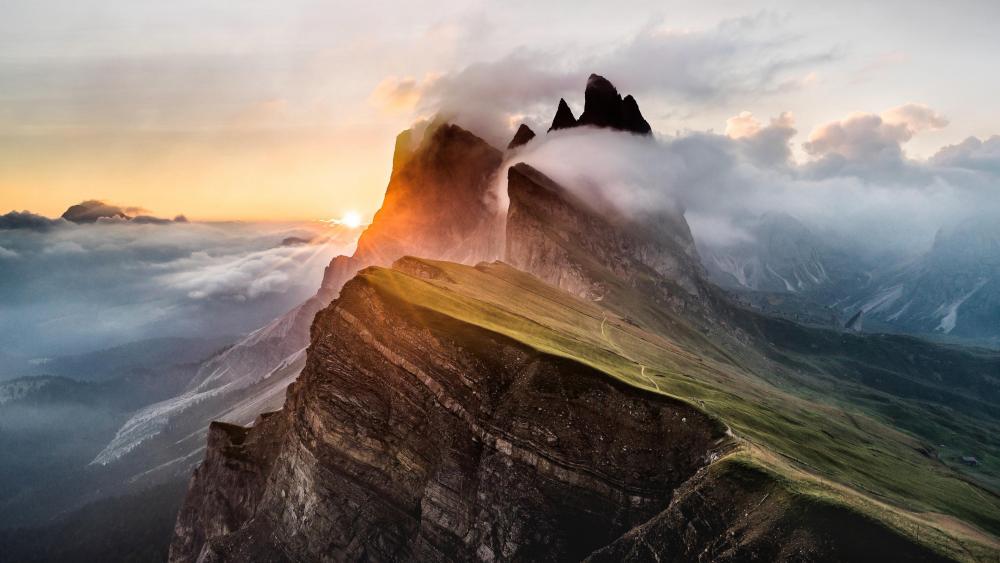 Sunrise with morning fog in Odle Mountains wallpaper