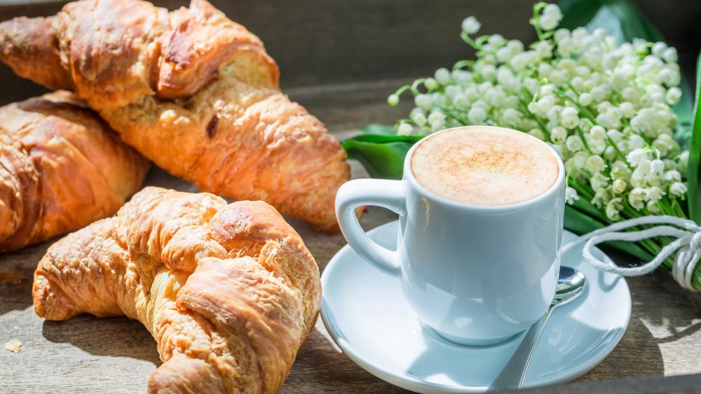 Croissant with coffee for breakfast wallpaper