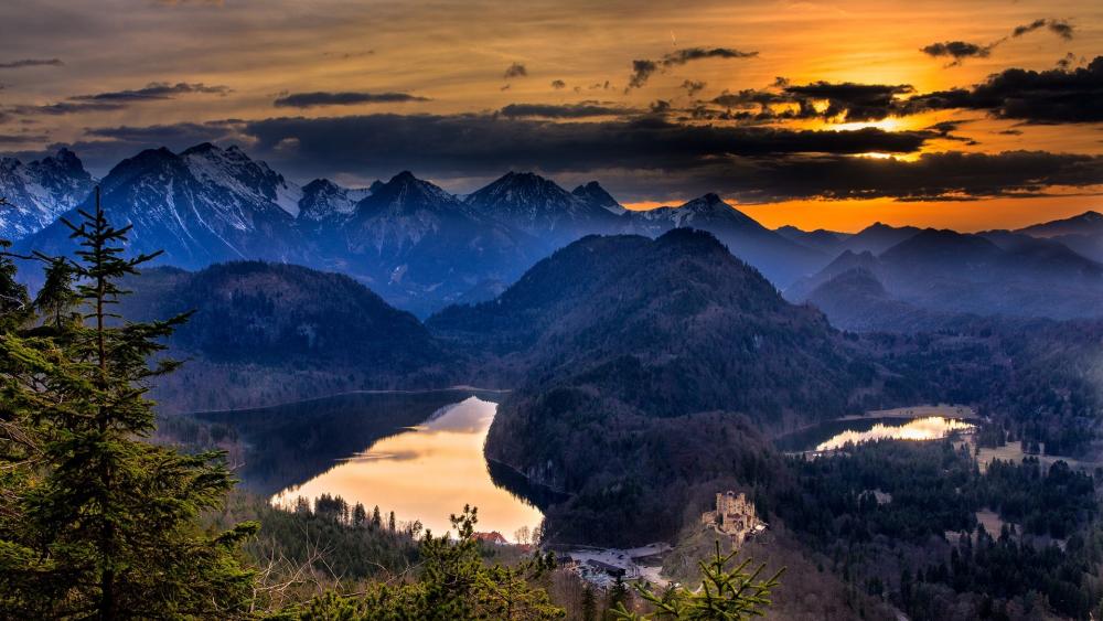 Bavarian Alps and the Hohenschwangau Castle in the distance wallpaper